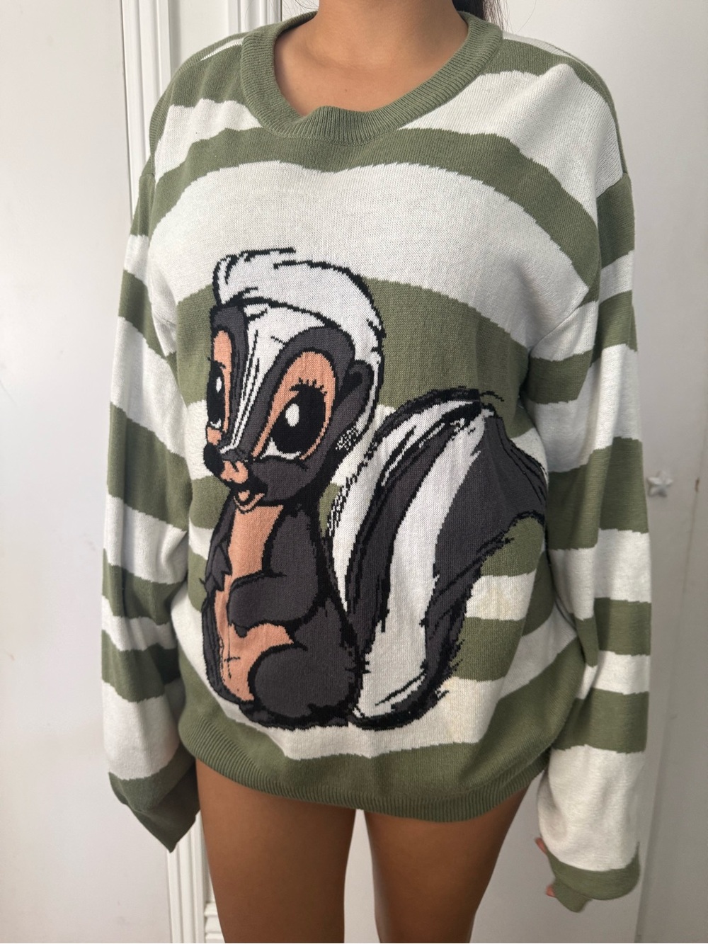 DISNEY Bambi Flower Skunk Green and White Striped Graphic Sweater